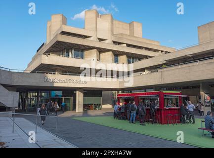 Pop up bar outside National theatre brutalist style building by Denys Lasdun in the South Bank Complex opened in 1976. London. Stock Photo
