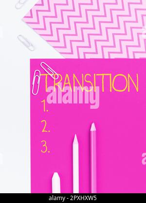Writing displaying text Transition, Concept meaning a dramatic or sweeping alteration of shape or appearance Stock Photo