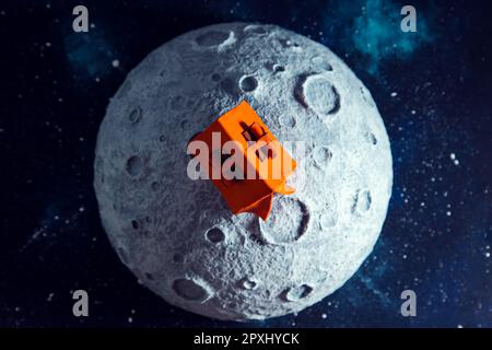 Plasticine tent on the Moon, starry background. The concept of space tourism development. Stock Photo