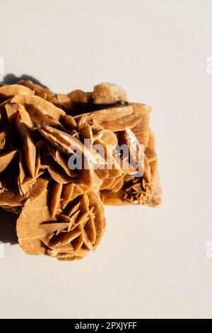 Desert rose mineral cluster from Tunisia, North Africa on white Stock Photo