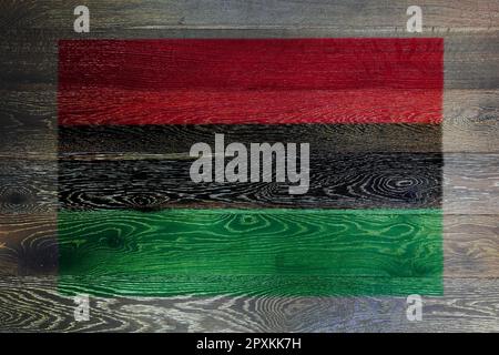 An African American flag on rustic old wood surface background Stock Photo