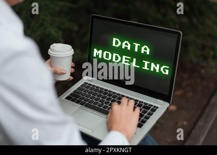 Text caption presenting Data Modeling, Business showcase process of transferring data between data storage systems Stock Photo