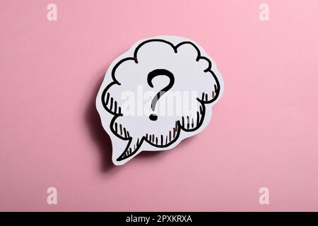 Question mark speech bubble of business concept on pink background. Stock Photo