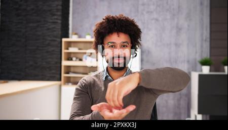 African American Deaf Man Using Sign Language Stock Photo