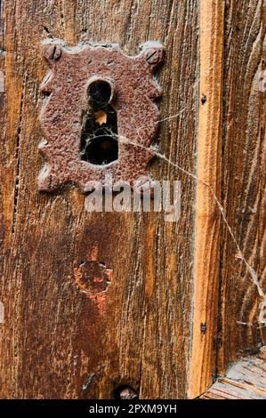 old lock on an old wooden door Stock Photo