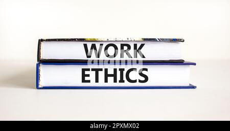 Work ethics symbol. Concept words Work ethics on beautiful books. Beautiful white table white background. Business and Work ethics concept. Copy space Stock Photo