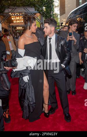 New York, United States. 01st May, 2023. NEW YORK, NEW YORK - MAY 01: Priyanka Chopra wearing Valentino and Nick Jonas departs The Pierre Hotel for 2023 Met Gala on May 01, 2023 in New York City. Credit: SOPA Images Limited/Alamy Live News Stock Photo