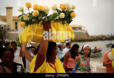 salvador, bahia, brazil - february 2, 2016: Supporters of Orixa Yemanja are seen during Candomble ritual celebration at Rio Vermelho beach in Salvador Stock Photo