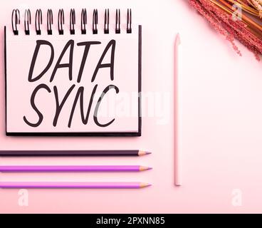 Text caption presenting Data Sync, Conceptual photo data that is continuously generated by different sources Stock Photo