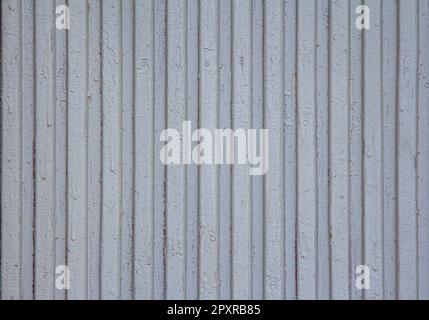 Grunge background - wooden planks surface with peeling white paint. Colorful cracked texture Stock Photo