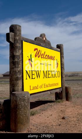 Yellow New Mexico Welcome sign located at the NM Welcome Center coming in from Texas, USA. Stock Photo