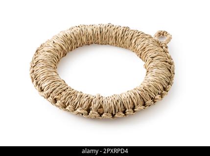 A potsherd made of straw on a white background. Craftwork. Stock Photo