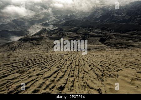 the sea of sand around Mount Bromo in the Bromo Tengger National Park, Semeru, East Java, Indonesia Stock Photo