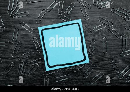 Paperclips Around Important Informations On Desk. Presented Recent Updates. Stock Photo