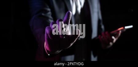 Man Holding Mobile Phone and Point On Recent Updates With One Finger. Stock Photo