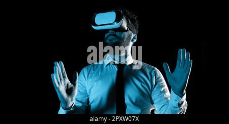 Man Wearing Vr Glasses And Presenting Important Messages Between Hands. Stock Photo