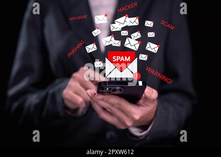 Warning notification, People with spam message icon on mobile phone Stock Photo