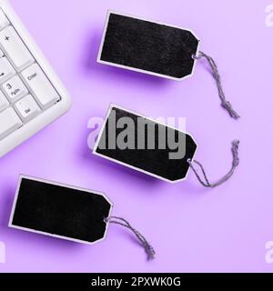 Colored paper with important message lying desk near keyboard. Stock Photo