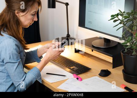 Sketch of wireframe for website. Women designer working on a mobile application, drawing on paper. Stock Photo