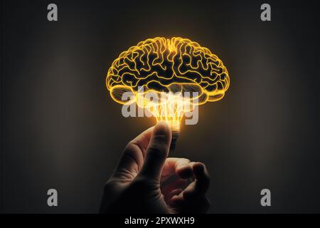 Brainstorm, creative idea and business success concept with digital glowing yellow human brain in man hand on abstract dark blank background with spac Stock Photo