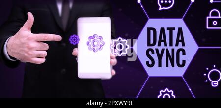 Text caption presenting Data Sync, Conceptual photo data that is continuously generated by different sources Stock Photo