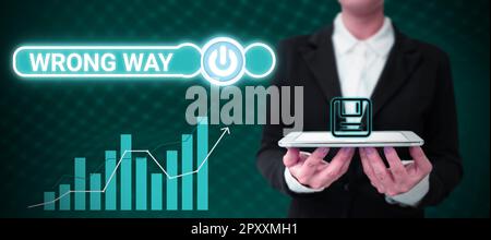 Text caption presenting Wrong Way, Concept meaning taking an unsuitable or undesirable manners or direction Stock Photo