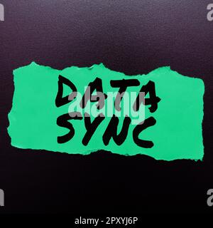 Writing displaying text Data Sync, Concept meaning data that is continuously generated by different sources Stock Photo