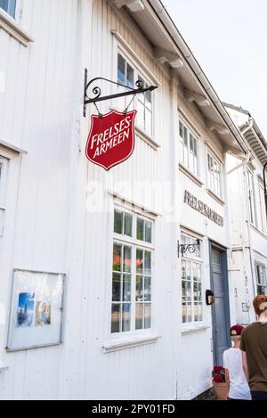 Grimstad, Norway - August 10 2021: Frelsesarmeen sign on teh exterior of a white wooden house. Stock Photo