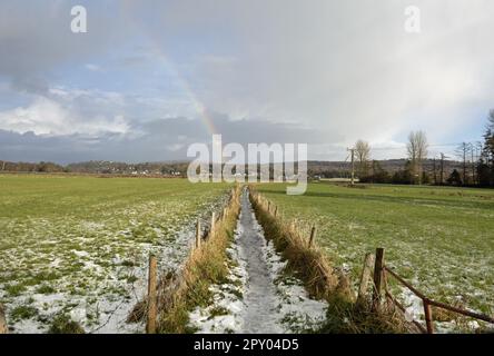 Rainbow winter day Arnside Moss Arnside Westmorland and Furness England Stock Photo