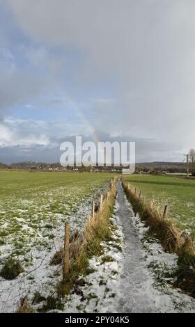 Rainbow winter day Arnside Moss Arnside Westmorland and Furness England Stock Photo