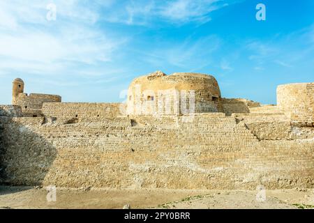 Walls and towers of Qalat al-Bahrain portuguese fortress, Manama, Bahrain Stock Photo