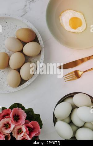 Aerial view of a fried egg on a green plate Stock Photo