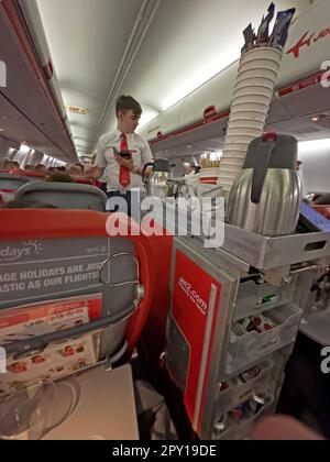 Jet2.com, Jet2 holiday company aircraft inflight cabin snack service, British package travel and flight company for vacations and short break holidays Stock Photo
