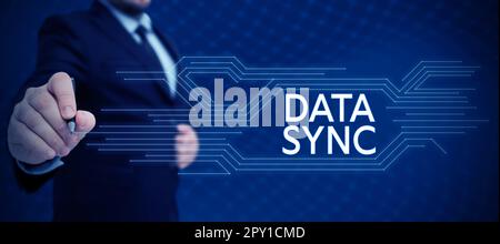 Hand writing sign Data Sync, Word for data that is continuously generated by different sources Stock Photo
