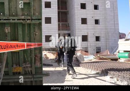 Sderot, Israel. 02nd May, 2023. Israeli Security forces and emergency personnel inspect the damaged in a house in the southern city of Sderot, Israeli on Tuesday May 2, 2023. Israeli has hit the eastern Gaza strip, followed by dozens Palestinian missiles fired from Gaza towards Israel after the announcement of the death of the Palestinian Khader Adnan in Israeli Prison, according to both sides officials. Photo by Israeli Police/UPI Credit: UPI/Alamy Live News Stock Photo