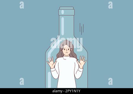 Depressed woman standing inside transparent bottle cant get out due to alcohol abuse. Young girl is trapped in need of treatment and rehab from strong Stock Photo