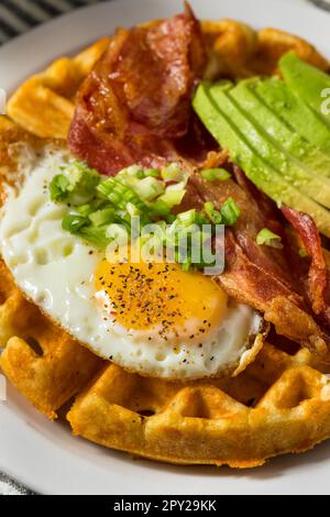 Homemade Savory Waffles with Bacon Egg and Avocados Stock Photo