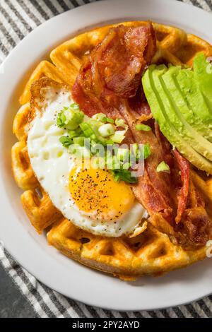 Homemade Savory Waffles with Bacon Egg and Avocados Stock Photo