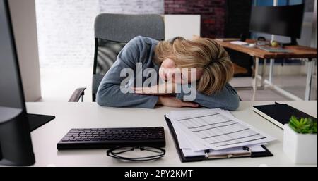 Bored Boss Woman Sleeping. Restful Tired Employee Stock Photo - Alamy