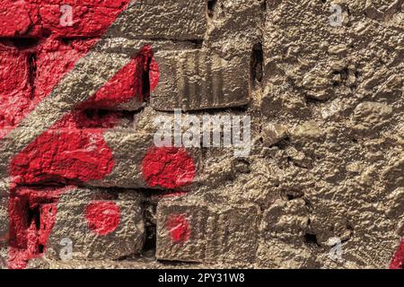 Abstract red golden background of painted brick wall texture, urban background Stock Photo