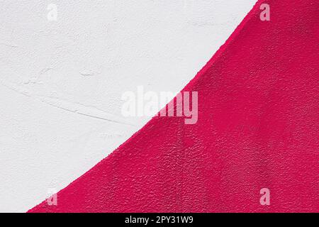 Vivid fragment of wall, bright street colors. Abstract white red pink background Stock Photo