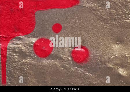 Drawn painted red circles on concrete wall. Graphic grunge texture. Abstract modern background, stylish pattern Stock Photo