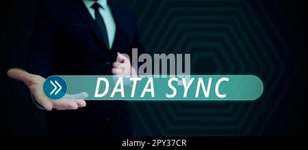 Conceptual caption Data Sync, Word Written on data that is continuously generated by different sources Stock Photo