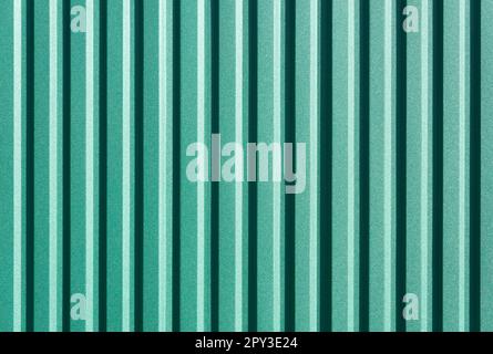 Green corrugated metal texture, bright abstract background. 3d texture. Stock Photo