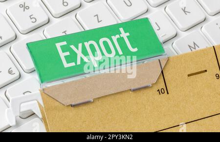 A brown file folder labeled Export Stock Photo