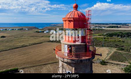 Aerial view of the Goulphar lighthouse on the island of Belle-île-en-mer in Morbihan, France - The tallest lighthouse on the biggest island of Brittan Stock Photo