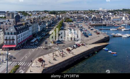 Aerial view of Concarneau, a medieval walled city in Brittany, France - Embankment with a modern parking and a carrousel Stock Photo