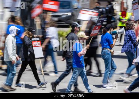 May 2, 2023 - Culver City, California : Members of The Writers Guild of America picket in front of Sony Pictures Studios. Stock Photo