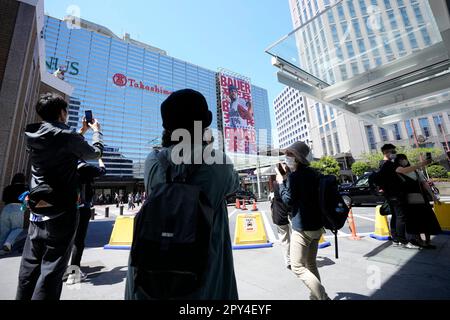 A poster of Trevor Bauer who's pitching for the Yokohama BayStars is placed  at the platform of a train station on Tuesday, May 2, 2023, in Yokohama  near Tokyo. Bauer will pitch