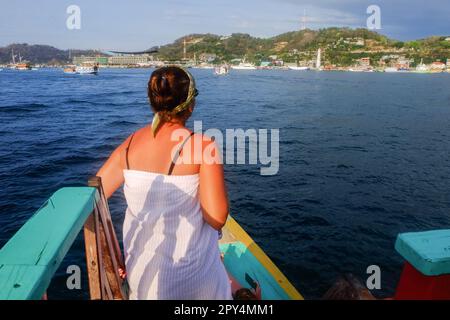 The atmosphere around Labuan Bajo Harbor, one of the main tourist destinations in East Nusa Tenggara, Indonesia, photographed in December 2019 Stock Photo